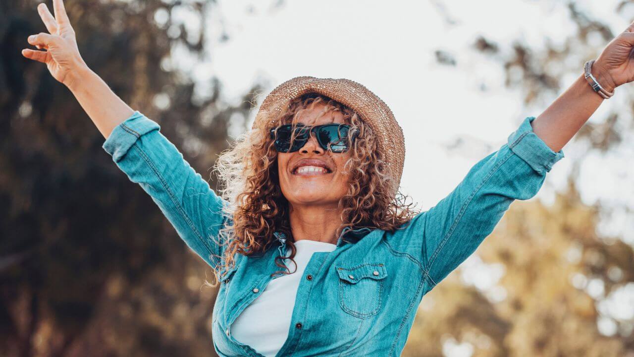 Happy Woman Outside Hat Smile