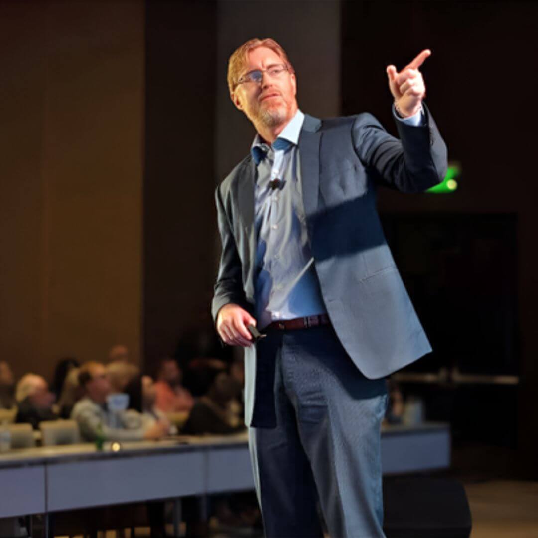 My EHI Aloha Dr. Ardis Standing On Stage At AGES Fall Conference Energetic Health Institute Dr Henry Ealy 1080 x 1080