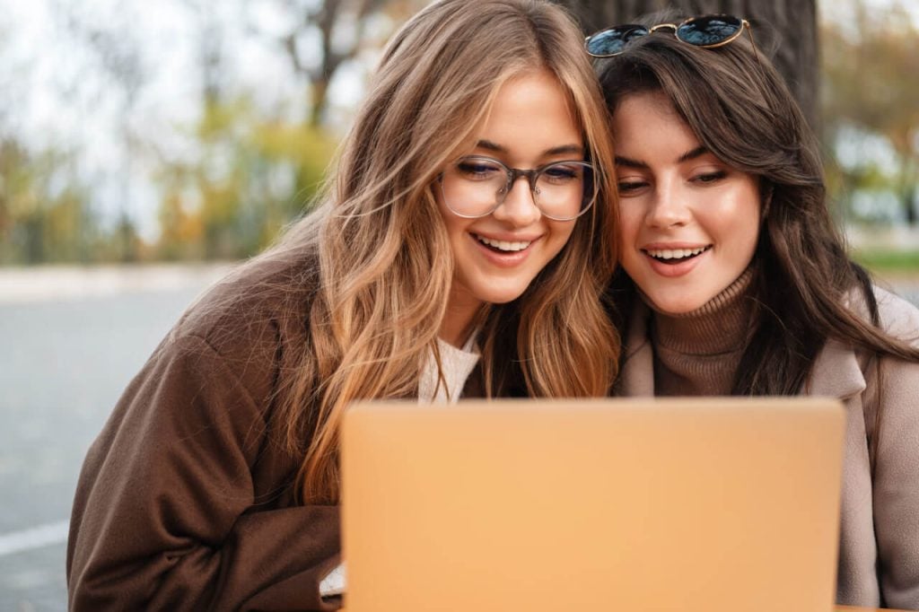 My EHI Aloha Energetich Health Institute Dr. Henry Ealy Happy Women Laptop Outdoors