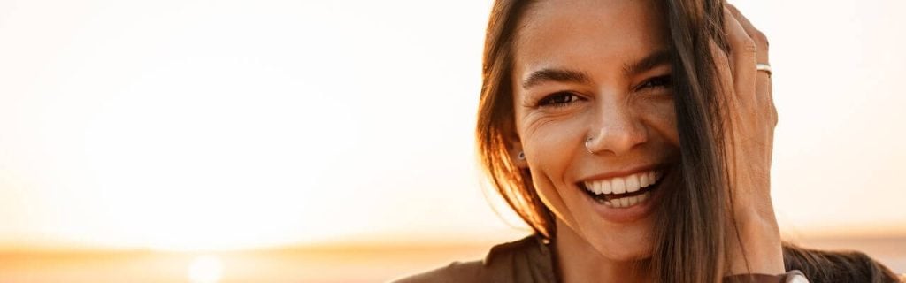 MyEHIAloha Energetic Health Institute Dr. Henry Ealy 1280 x 400 Happy Woman Sunset
