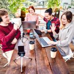 happy friends sharing content on streaming networks with smart phone cam qo07imcyuhhf029gu3lzbb5ynk8vld02i869amu924 1