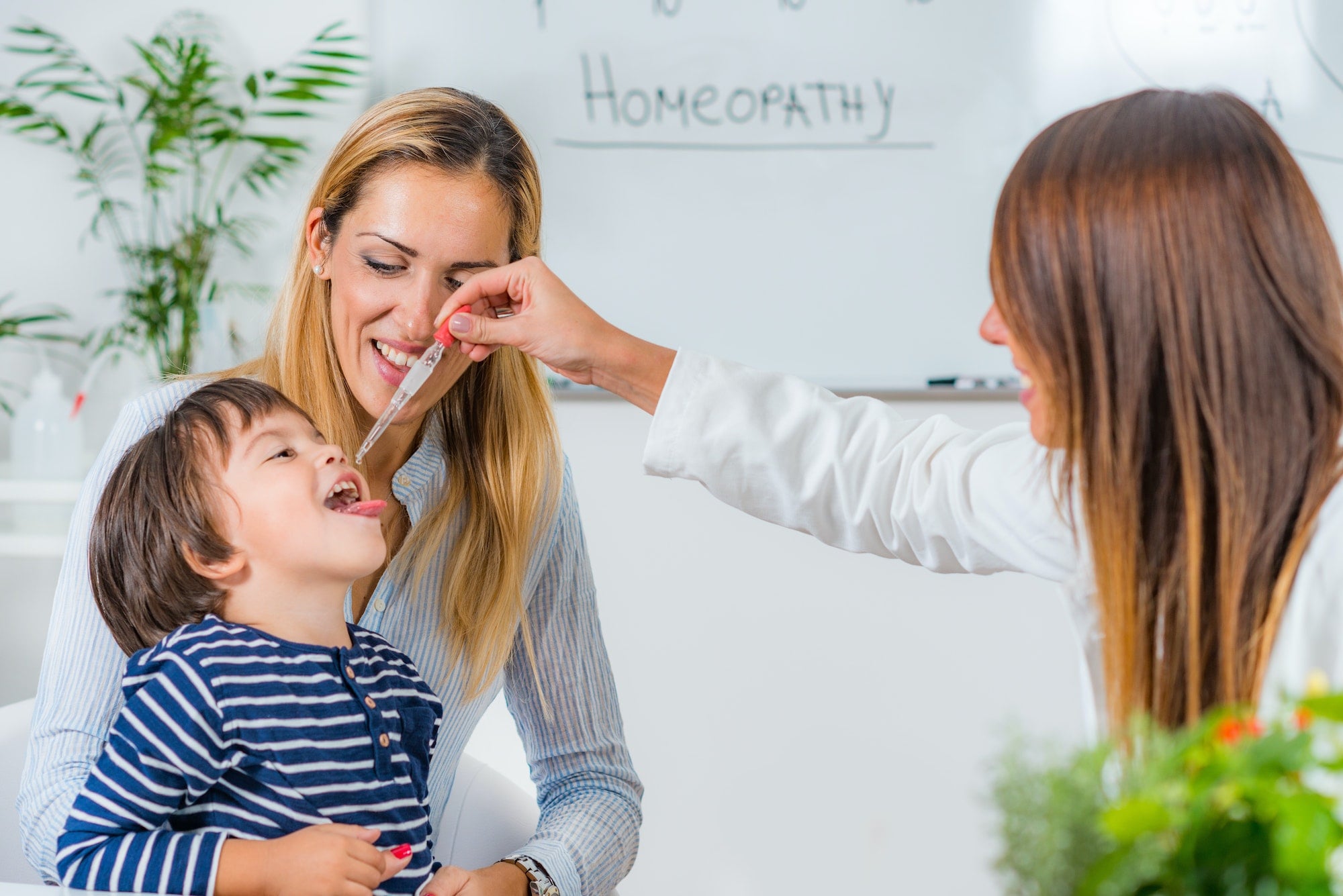 homeopathy mother and little boy visiting a homeopath